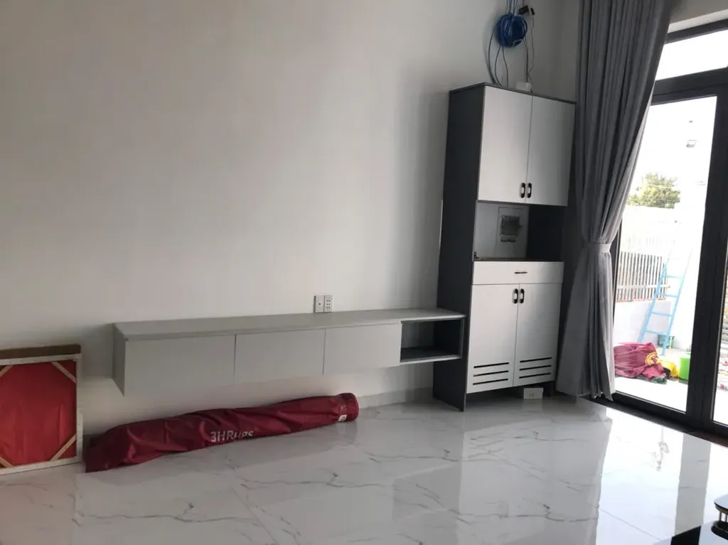 Phòng khách, Lối vào - Nhà phố Bình Dương - Phong cách Modern | Space T