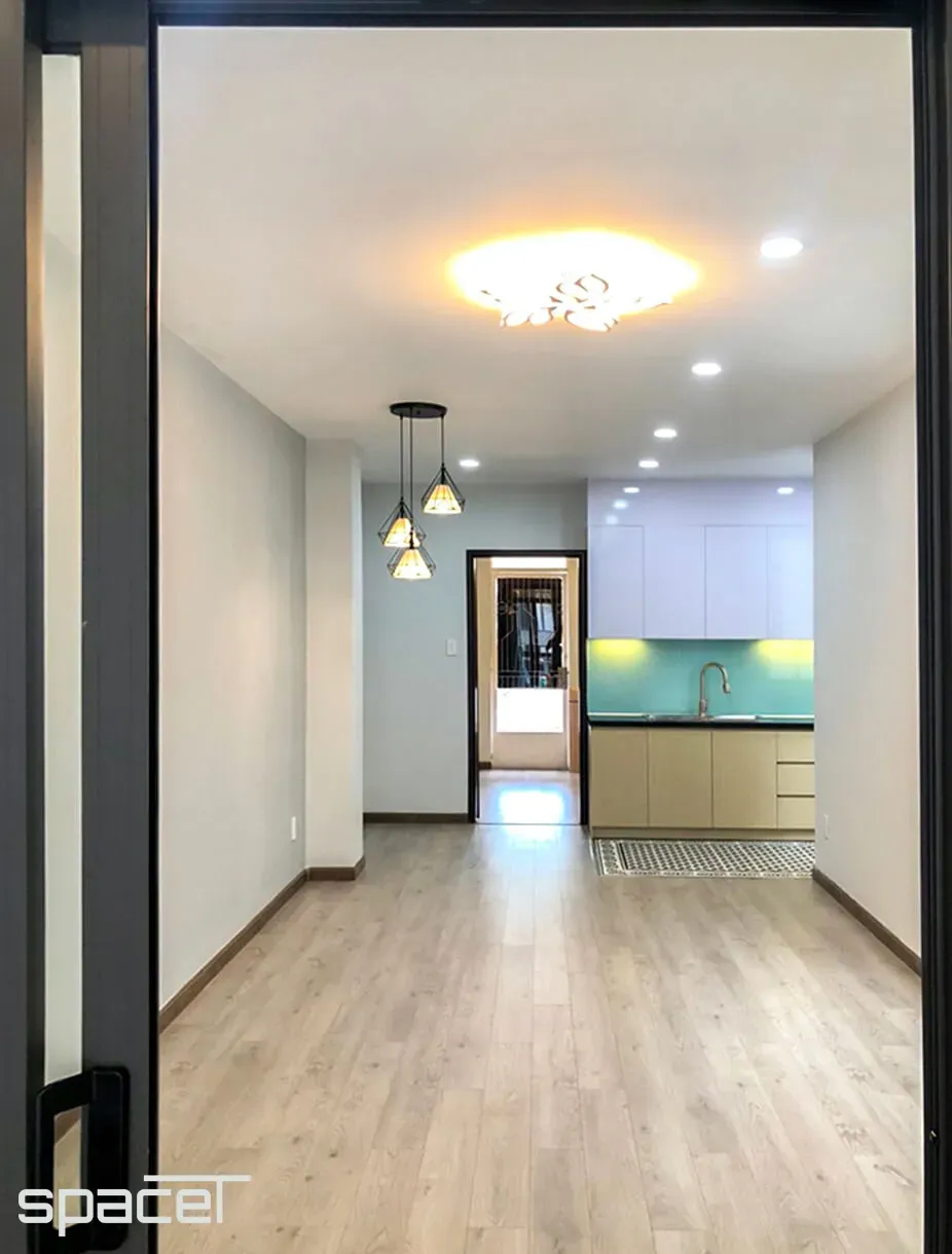 Phòng khách, Phòng bếp - Nhà phố Quận 1 - Phong cách Modern + Scandinavian | Space T