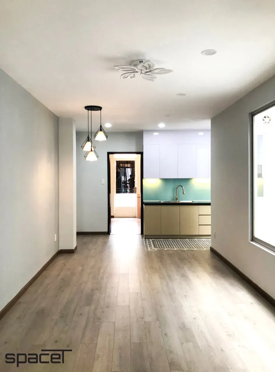 Phòng khách, Phòng bếp - Nhà phố Quận 1 - Phong cách Modern + Scandinavian | Space T