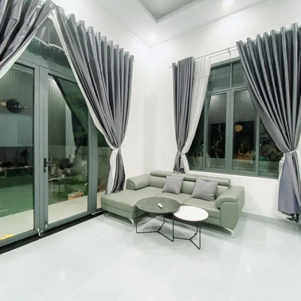 Phòng khách - Bỏ phố về quê xây nhà vườn thiết kế hiện đại, tối giản như “biệt thự mini” | Space T