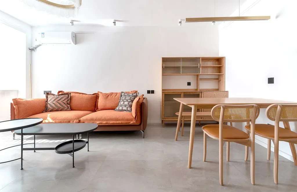 Phòng khách - Tổ ấm đơn giản kiểu Scandinavian với màu gỗ và cam cháy ấm áp | Space T