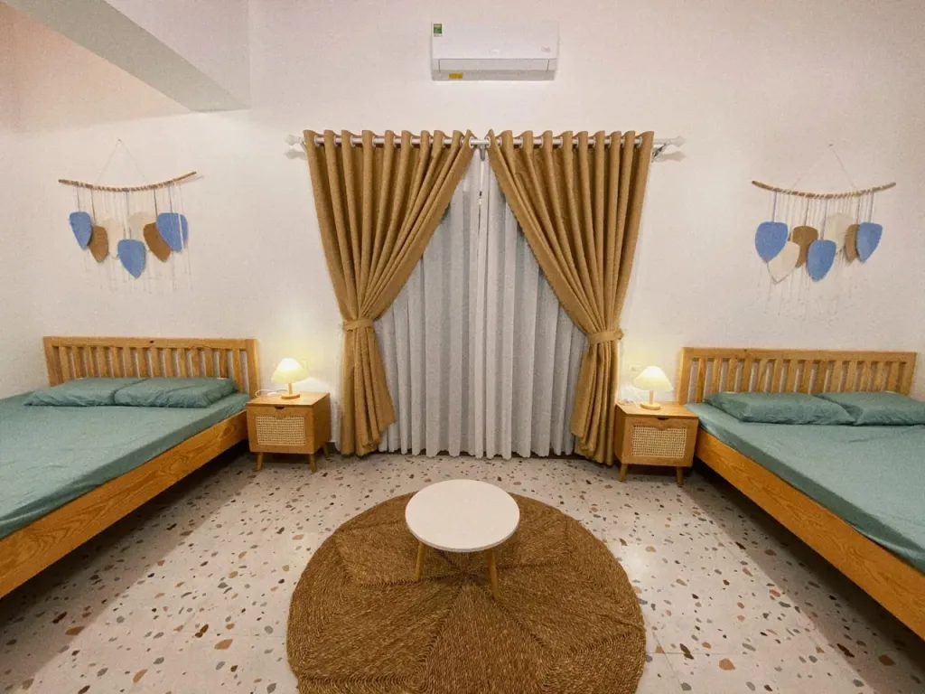 Phòng ngủ - Cặp đôi "rời phố xuống biển" xây căn homestay đầy thơ mộng  | Space T