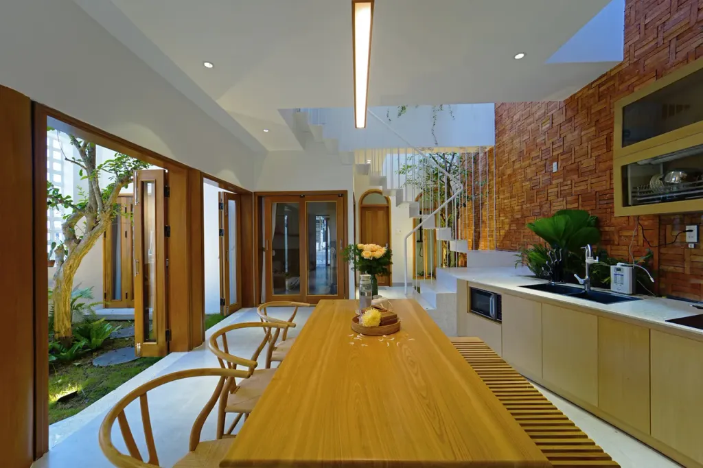 Phòng bếp - A House - Ngôi nhà 2 tầng bình yên với vật liệu mộc mạc cùng giếng trời thông gió tự nhiên   | Space T
