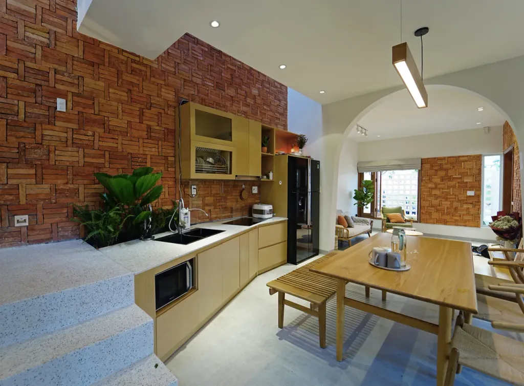 Phòng bếp - A House - Ngôi nhà 2 tầng bình yên với vật liệu mộc mạc cùng giếng trời thông gió tự nhiên   | Space T