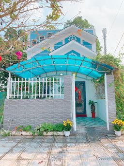 Mặt tiền - Làm nhà phố màu xanh biển với tầng lửng đủ công năng tiết kiệm chi phi 