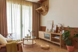 Phòng khách - Câu chuyện tổ ấm đầu tiên màu cam cháy và xanh rêu 