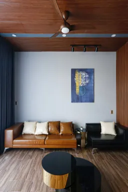 Phòng khách - Nhà phố 80m2 xây kiểu Hiện đại, tối ưu không gian với tông màu xám - đen sang trọng 