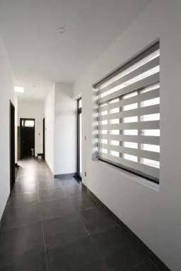 Lối vào - Nhà phố 80m2 xây kiểu Hiện đại, tối ưu không gian với tông màu xám - đen sang trọng 