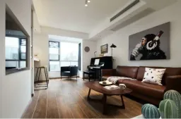 Phòng khách - Căn hộ tinh tế, trang nhã với tông màu trắng - đen - nâu gỗ của một nghệ sỹ 