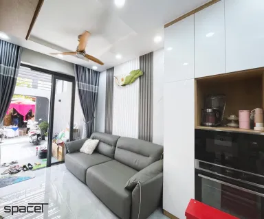 Phòng khách - Nhà phố Quận 12 - Phong cách Modern