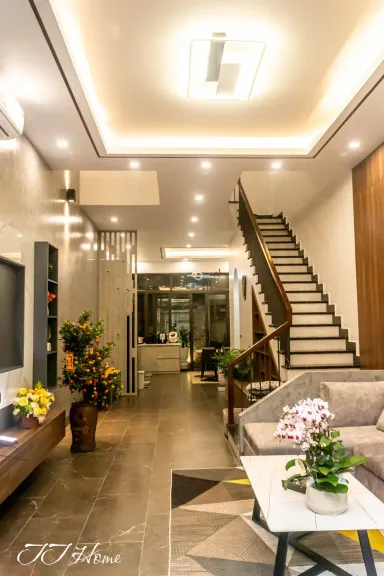 Phòng khách - Nhà phố diện tích nhỏ được mở rộng không gian với phong cách Modern 