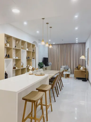 Phòng khách Phòng bếp Phòng ăn - Căn hộ 106m2 được phối màu nội thất nâu - trắng trang nhã mà hiện đại