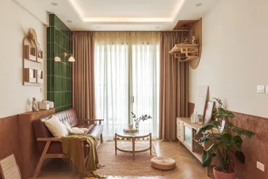 Phòng khách - Câu chuyện tổ ấm đầu tiên màu cam cháy và xanh rêu